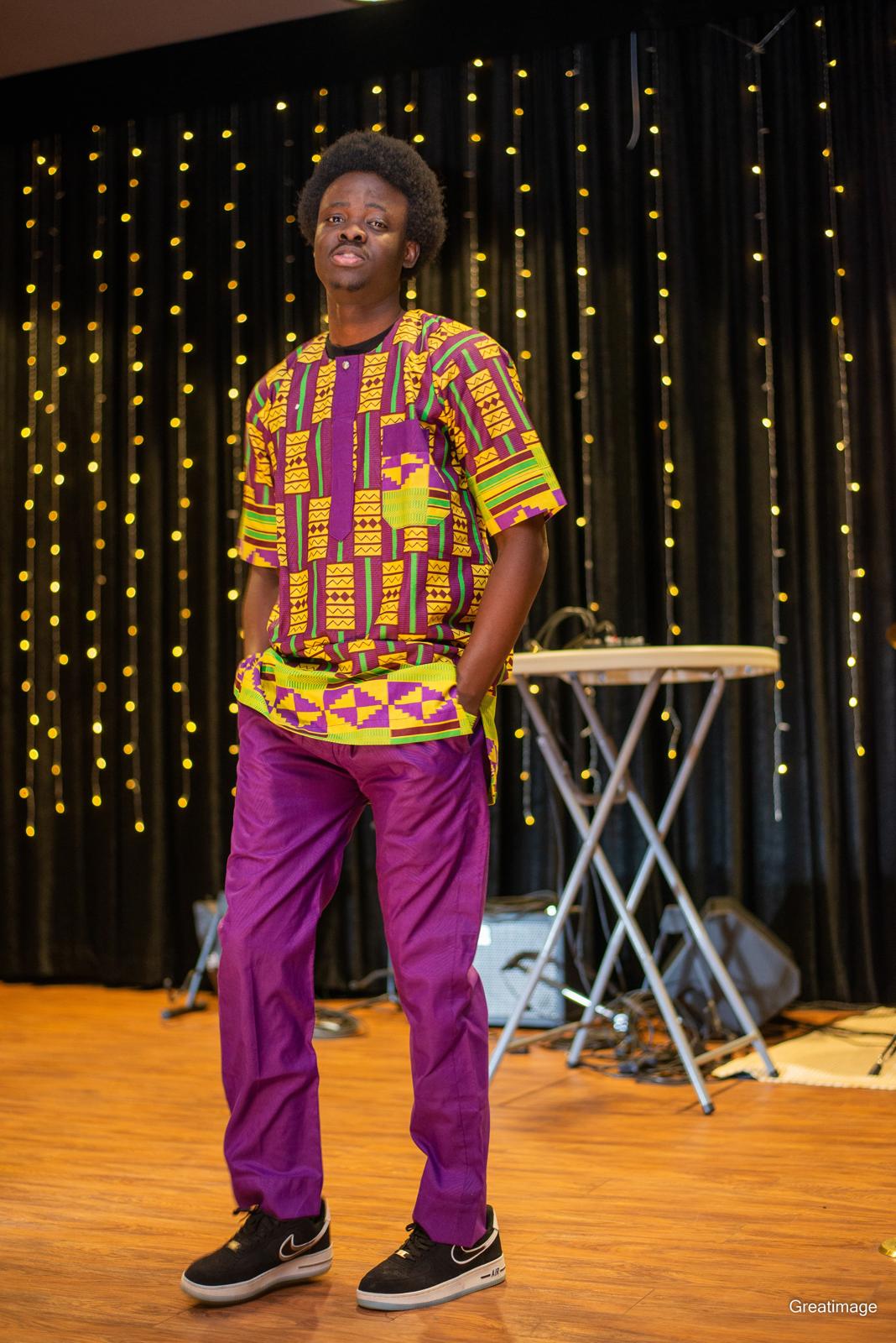Short Sleeve Ankara Top paired with sleek Purple Pants